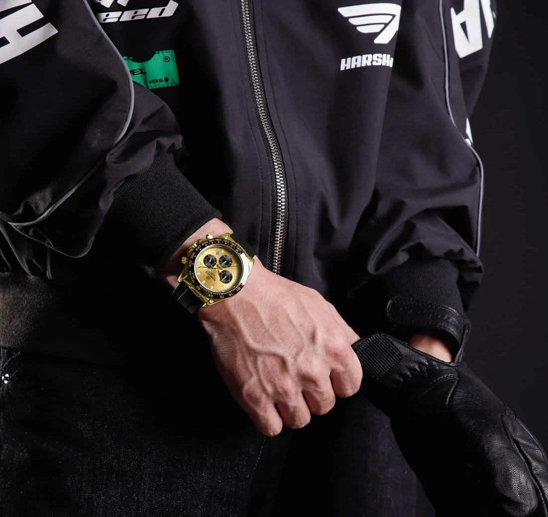 NAVIFORCE NF8054 G/G/B Men
Watch – Gold Case, Black Tachymeter Bezel, Black Silicone Strap