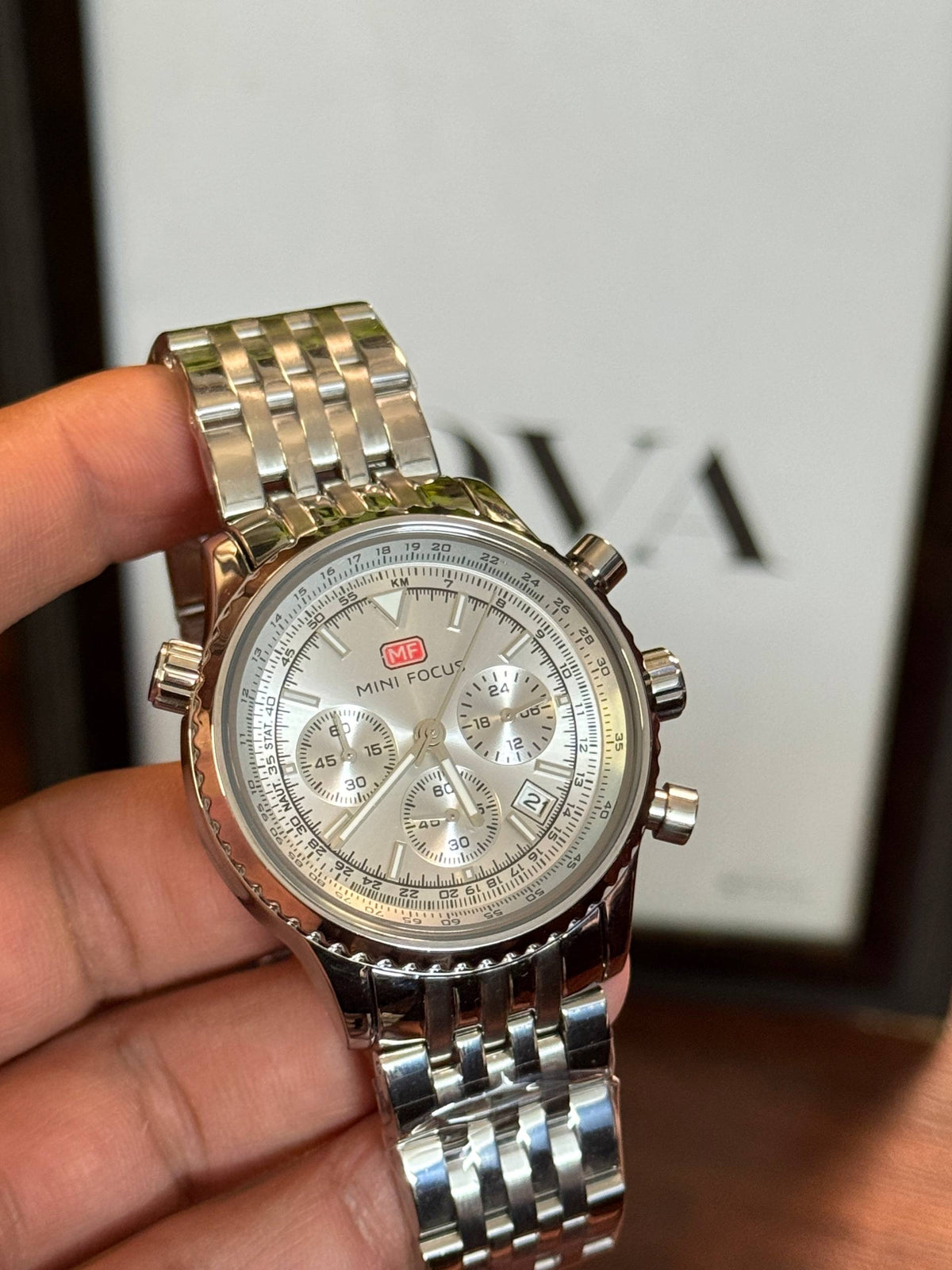 MINI FOCUS Men's Pilot Chronograph Watch – Silver Dial, Slide Rule, Stainless Steel Bracelet