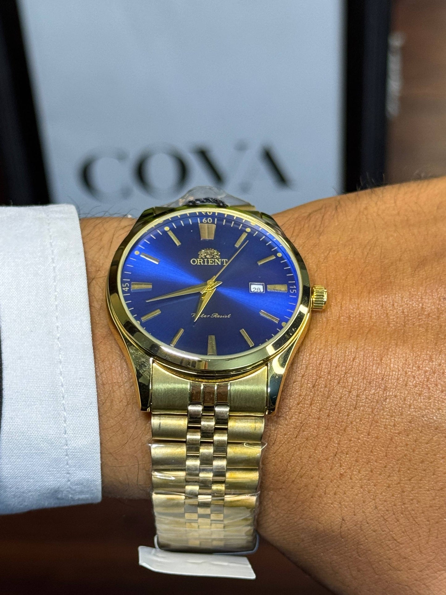 Orient Men's Dress Watch – Gold-Tone Blue Dial Stainless Steel Quartz