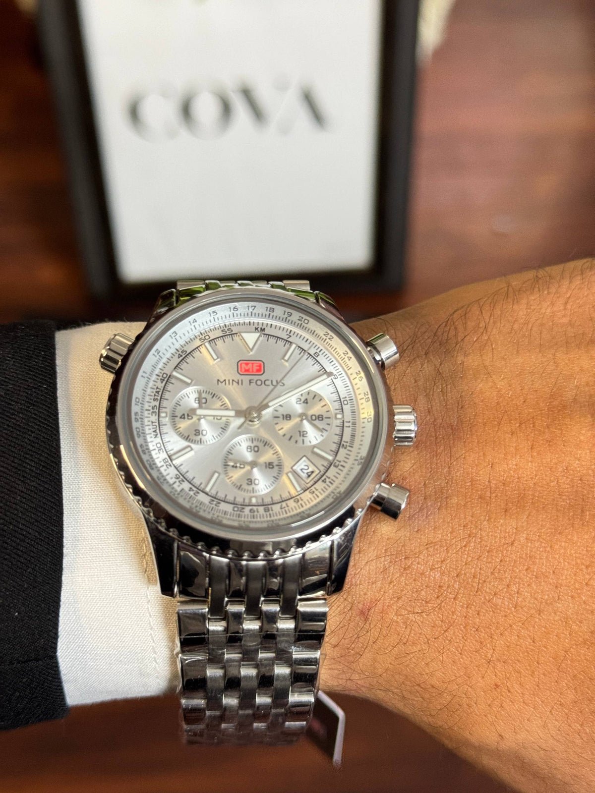 MINI FOCUS Men's Pilot Chronograph Watch – Silver Dial, Slide Rule, Stainless Steel Bracelet
